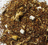 Close-up of dried herbs and spices for a Root Beer flavored herbal tea. 